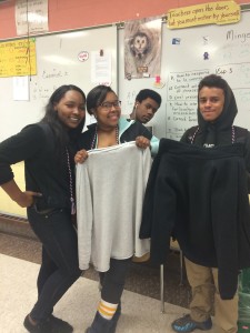 Students in in the New Britain JAG Career Association fold clothing donated through the first annual JAG clothing drive at New Britain High School.